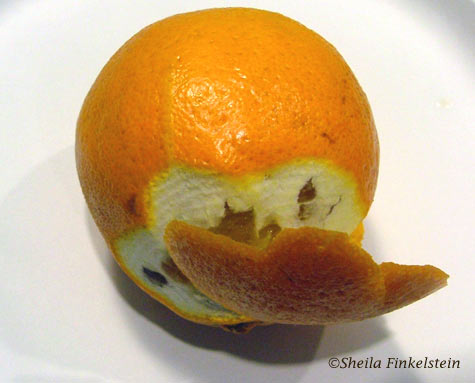 orange waiting to be peeled